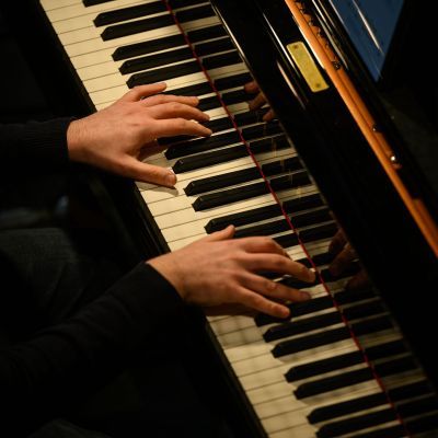 Student playing piano